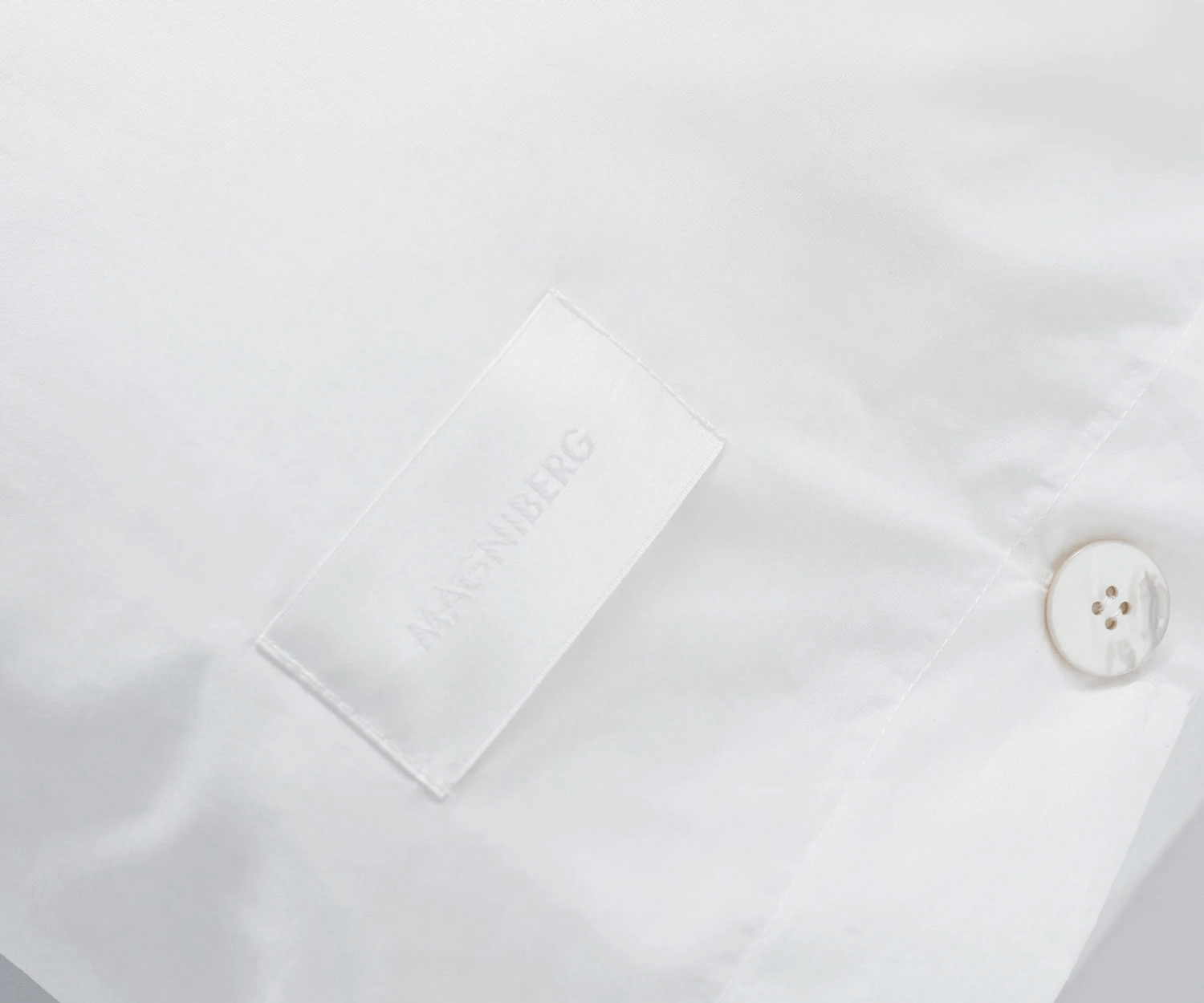 Magniberg_Bettwaesche_Mother_Poplin_White_Detail Ropa de cama Magniberg MOTHER POPLIN - Detalle